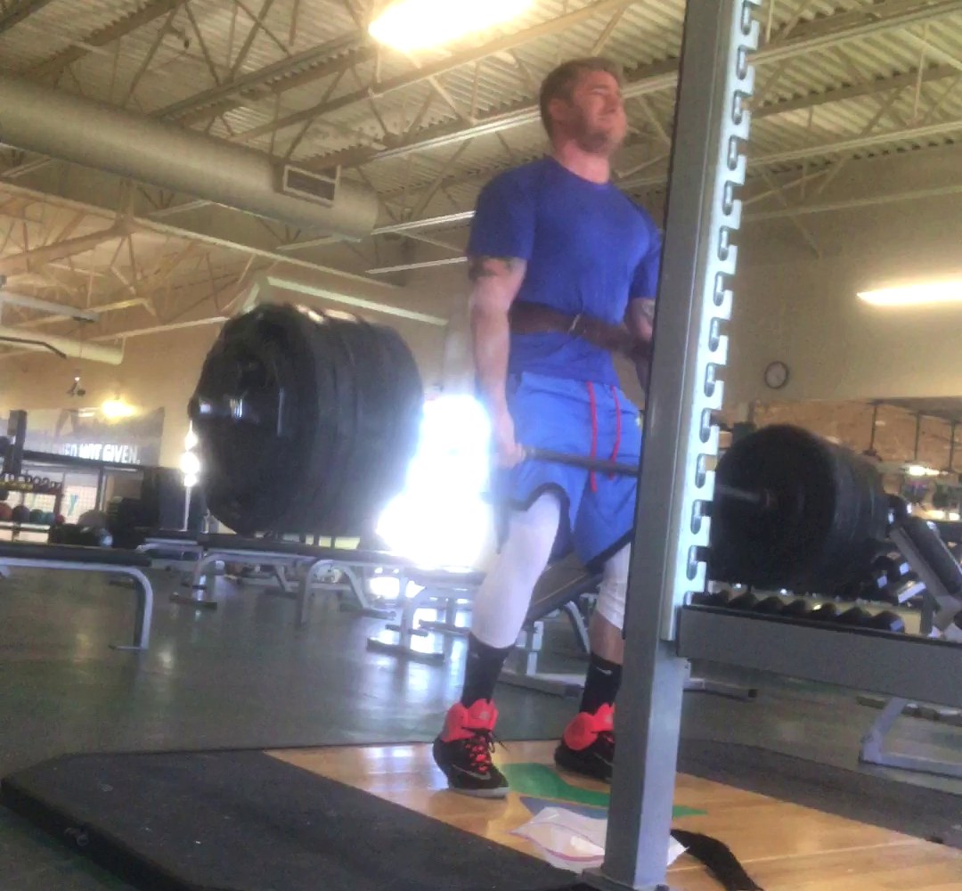 Mitchell locking out a heavy deadlift